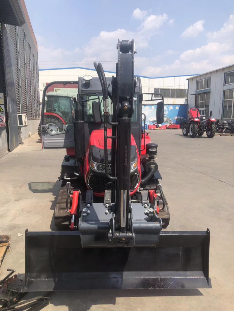 Crawler type rotary tiller with cab