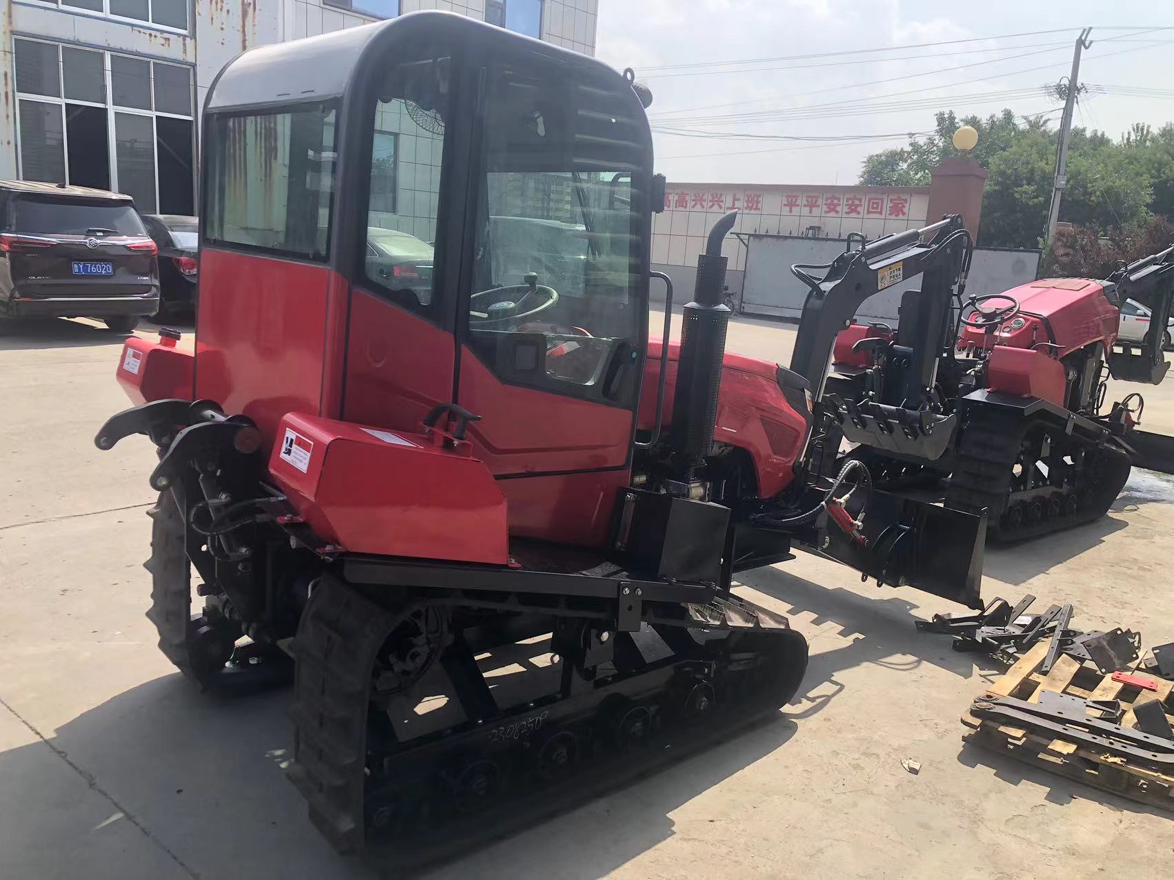 Crawler type rotary tiller with cab