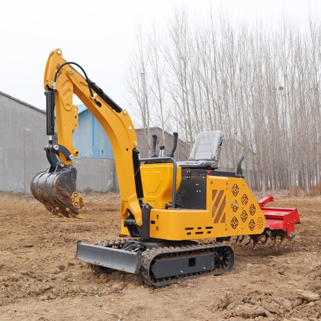 Small excavator with a rotary tiller