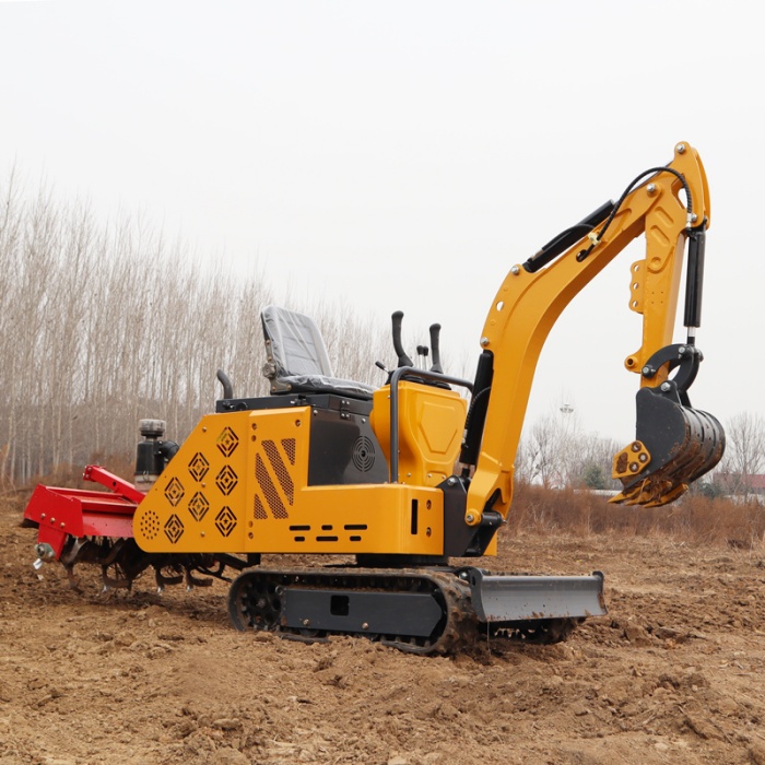 Small excavator with a rotary tiller